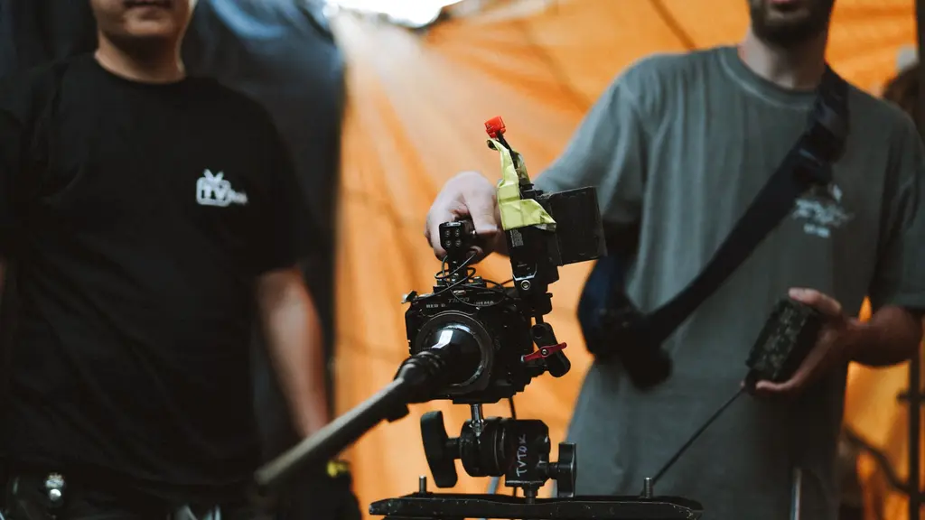 a handheld camera rig resting on an apple box between takes