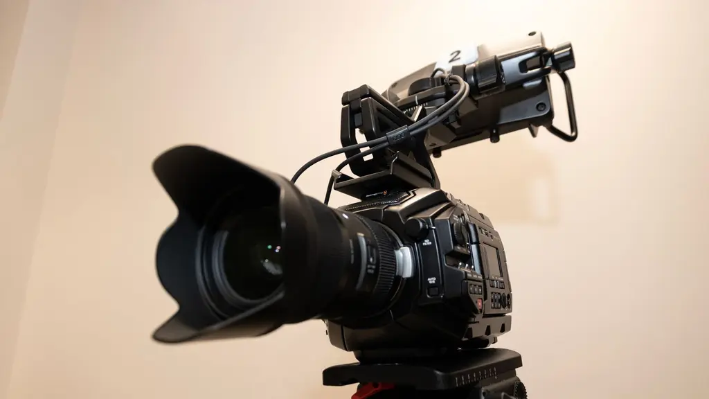 a handheld camera rig resting on an apple box between takes